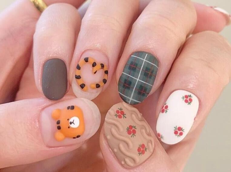 手繪老虎美甲欣賞 | 學(xué)美甲來麗竹學(xué)校